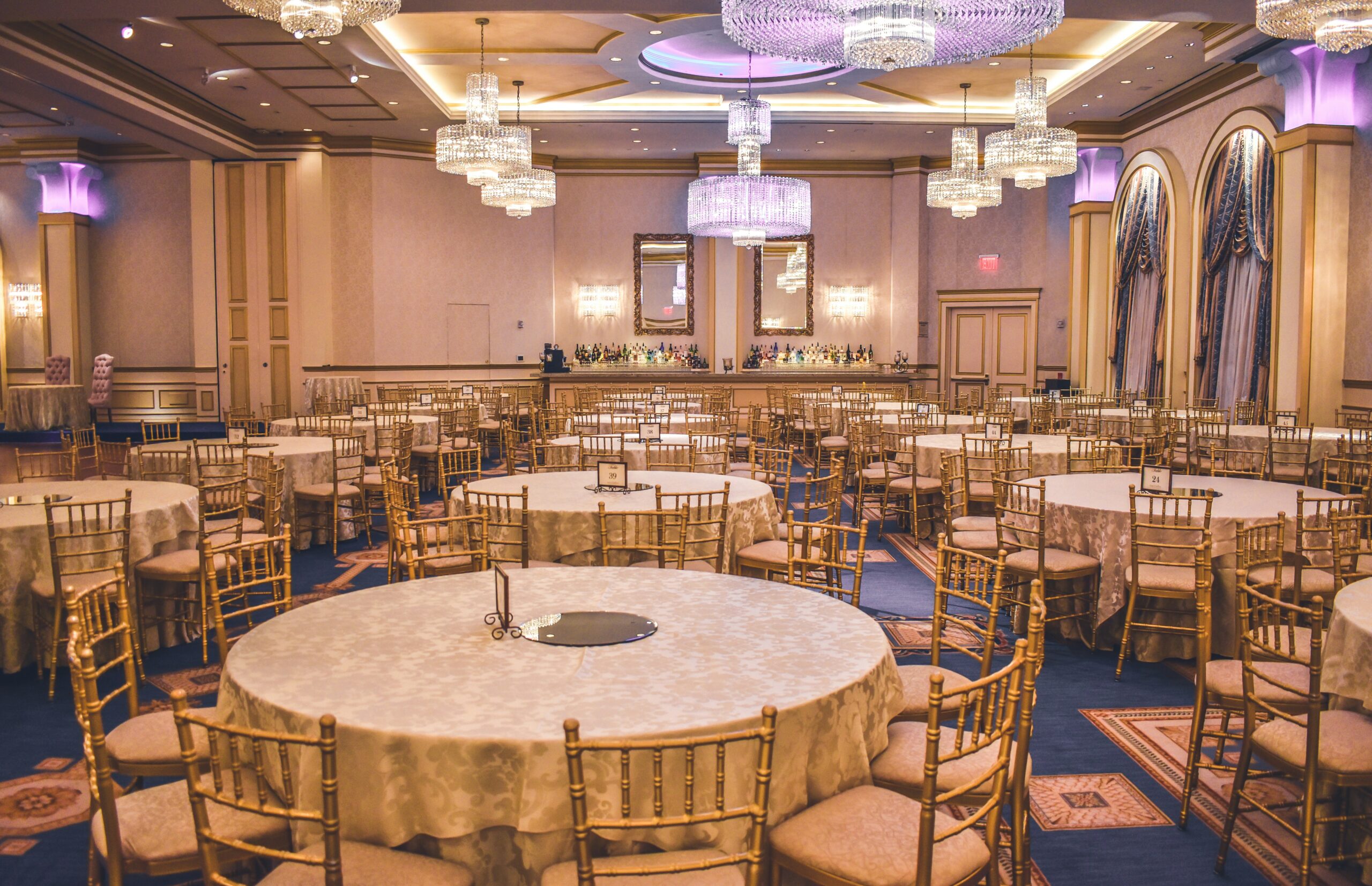 Formal gala tables in a hotel banquet room