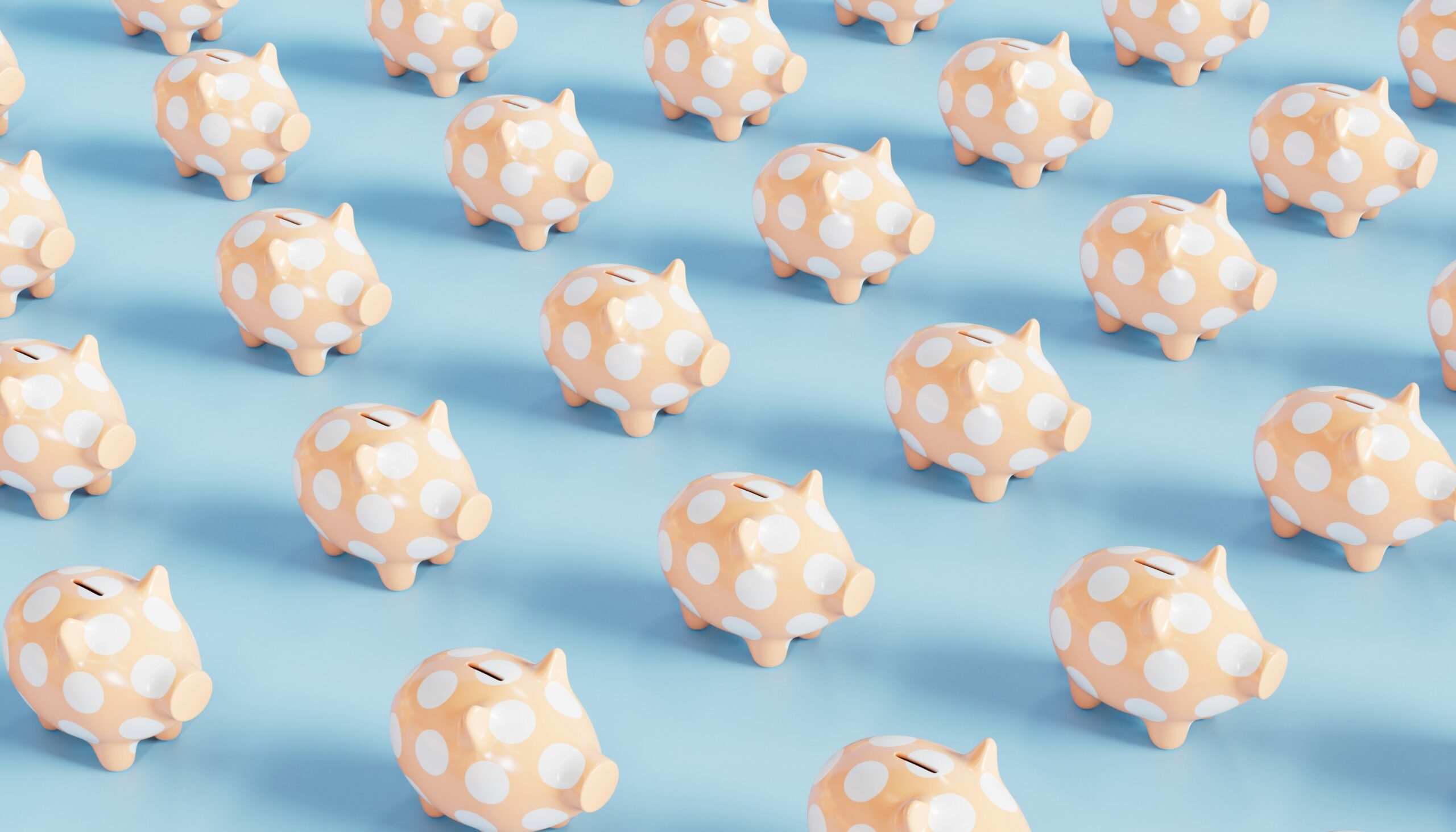 cute polka dot piggy banks on a blue background